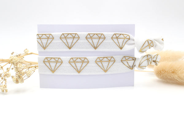 2tlg. elastisches Armband Set weiß mit goldfarbenem Diamanten Aufdruck, auf Karte