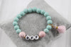 Armband Perlen personalisiert in türkis und rosa mit goldfarbenen Details für deine beste Freundin