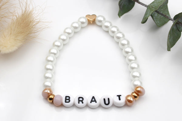 Namensarmband Damen aus weiß perlmutt farbenen Perlen mit Herz in rosegold, personalisiert mit deinem Namen z.B. Braut und elastisch Gummiband
