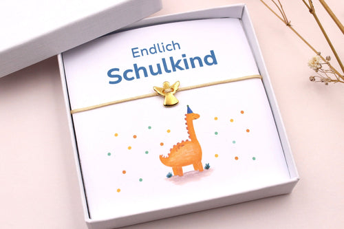 Geschenke zur Einschulung, Armband mit Karte Dino für den Schulstart des Schulkindes
