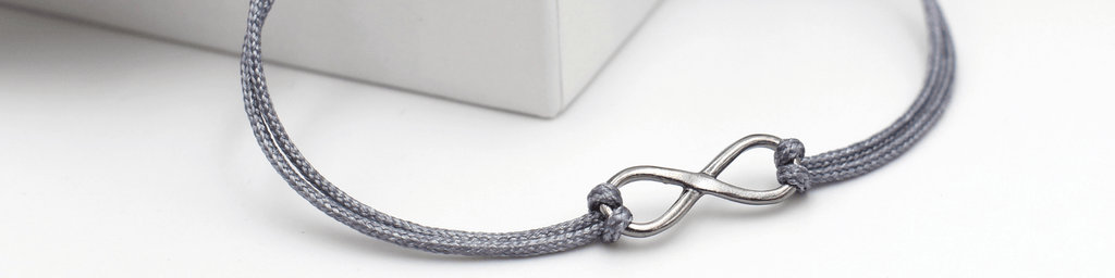 robuste Herrenarmbänder aus Makramee mit angesagten Anhängern und edlen Symbolen aus 925 Sterling Silber für den modernen Mann