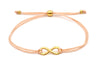 apricot farbenes Infinity Armband als Zeichen der ewigen und unendlichen Liebe mit goldenem Kugel Verschluss
