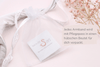 Weißer Organzabeutel mit Pflegepass von Beautysart Design als Verpackung für das Armband