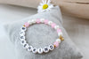 Blumenkind Armband aus rosa und weißen Perlen mit Herz Anhänger gold