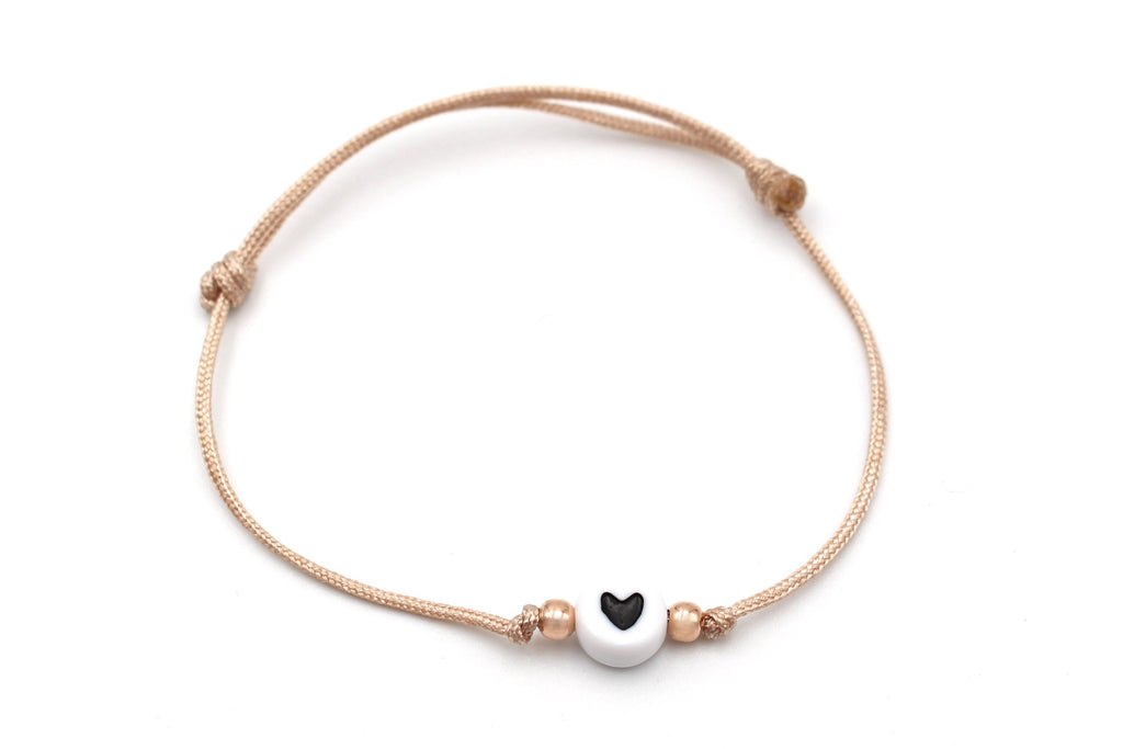 Rosenholz farbenes Armband mit Schiebeknoten und weiß schwarzer Herz Perle sowie 925 Silber Perlen Rosé vergoldet