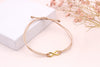 Makramee Armband mit goldfarbenem Unendlichkeitszeichen