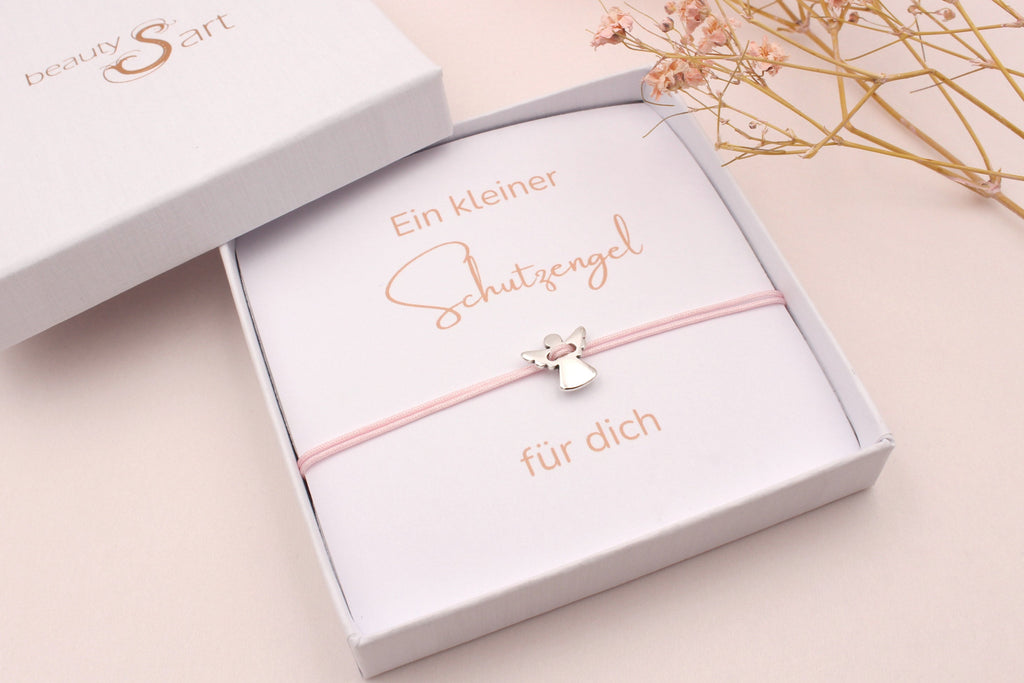 Rosa Schutzengel Armband in silberfarben mit gelber Schutzengel Karte und Text: Ein kleiner Schutzengel für dich"
