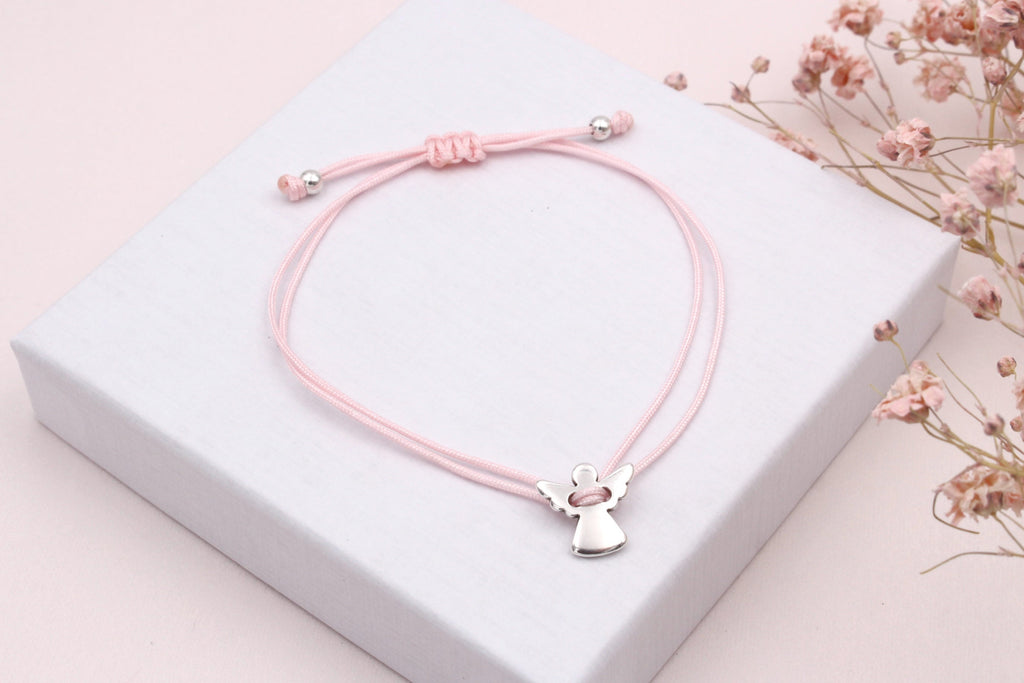 Zartes Schutzengel Armband aus rosa Makramee mit silberfarbenem Schutzengel in der Mitte