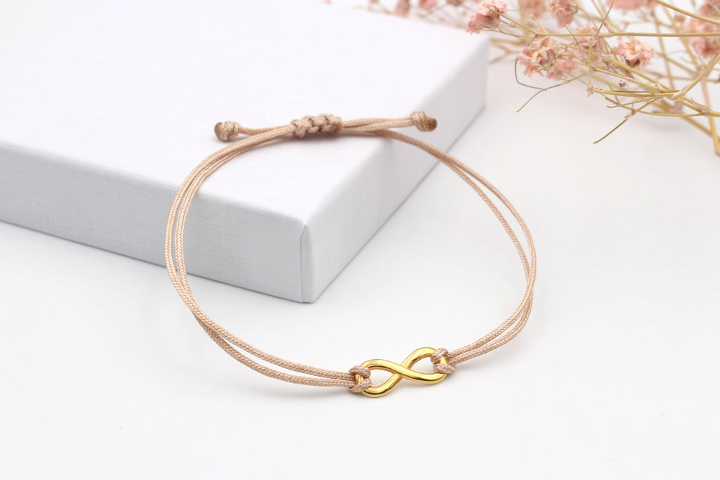 Familienarmband oder Partnerarmband mit Infinity Schleife in goldfarben