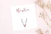 Weihnachtskarte mit der Aufschrift Merry X-Mas für dein persönliches Weihnachtsgeschenk