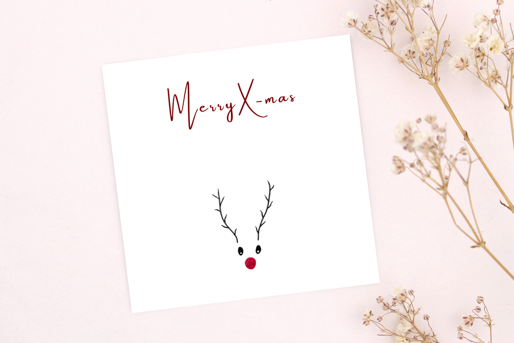 Weihnachtskarte mit der Aufschrift Merry X-Mas für dein persönliches Weihnachtsgeschenk
