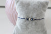 modernes Makrameearmband  mit Perlen 925 Silber und blauem Band