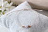 Makramee Armband mit Perle in Rosenholz rosegold und geflochtenem Makrameeverschluss