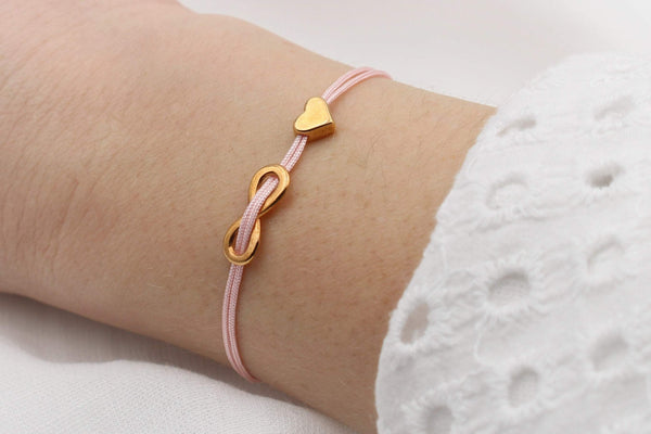 Armband Infinity Herz Farbe rosegold und geflochtenem Makramee Verschluss